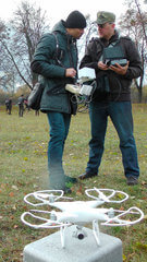 Аэросъемка спортивного соревнования студией Rmedia. Квадрокоптер DJI Phantom 4 с персоналом: пилот и оператор