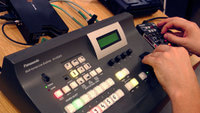 Режиссерский пульт в ПТС "раскладушка" (видеомикшер Panasonic AV-HS 300G). Съемка в 5 камер